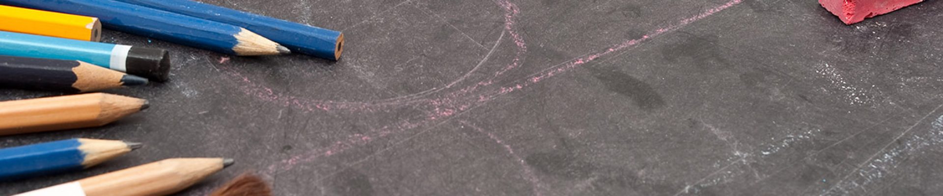 Chalkboard with school tools